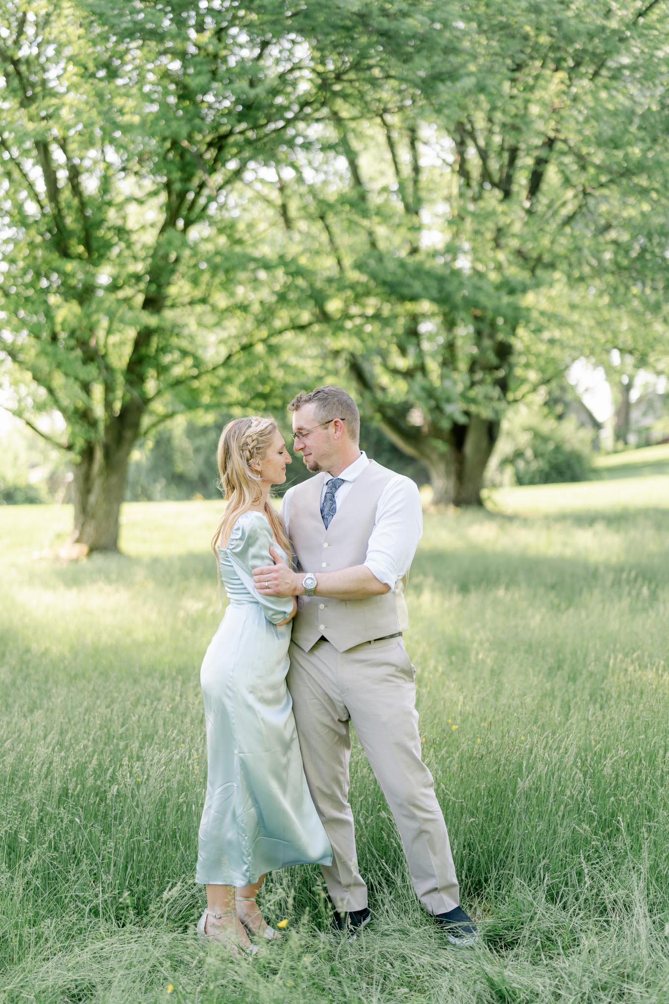 woman in blue dress embracing man in tan vest and suit pants Brandywine Valley Things To Do