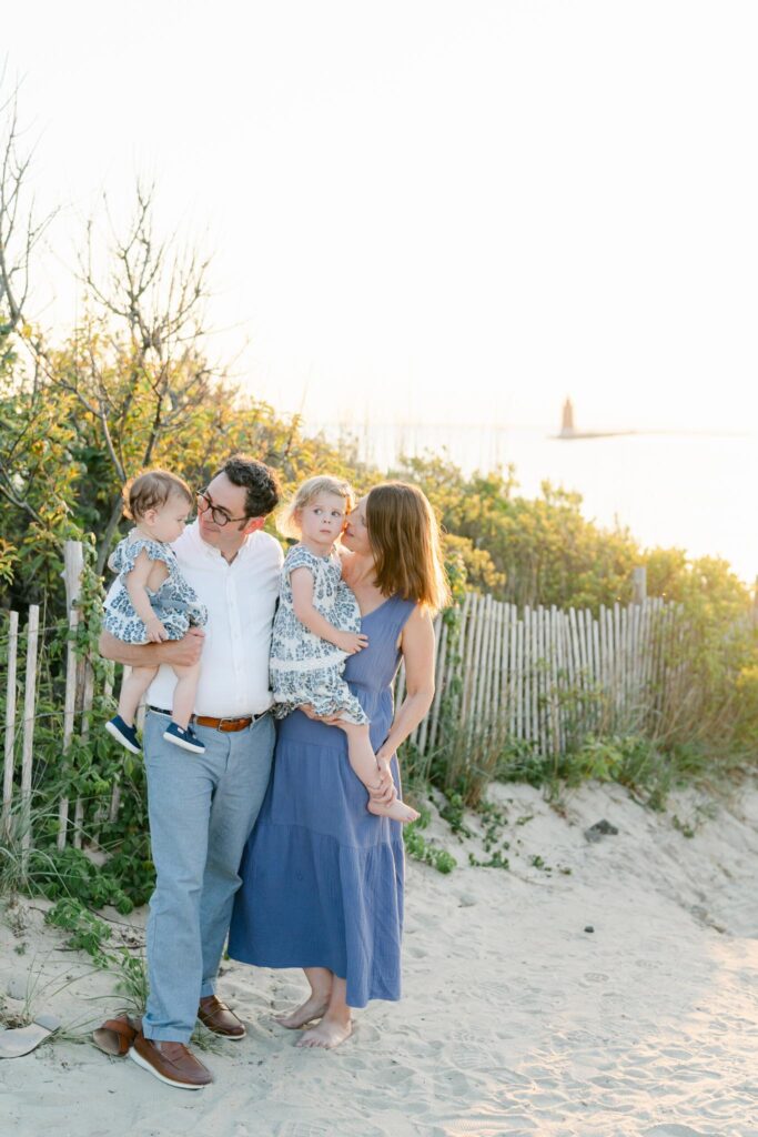 Family poses on the trail to The Point at Cape Henlopen State Park