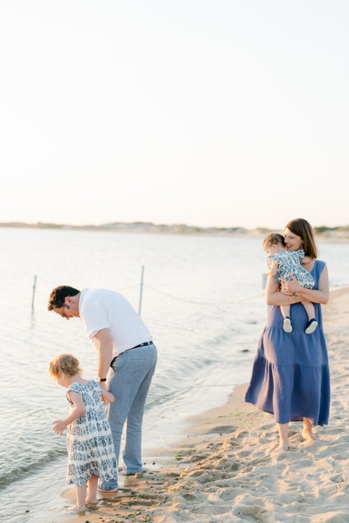 Photographer in Lewes DE captures the family plays at the beach at sunset