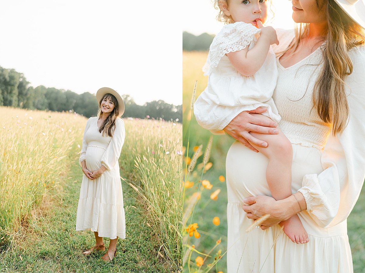 pregnant mother holding daughter in wildflower field