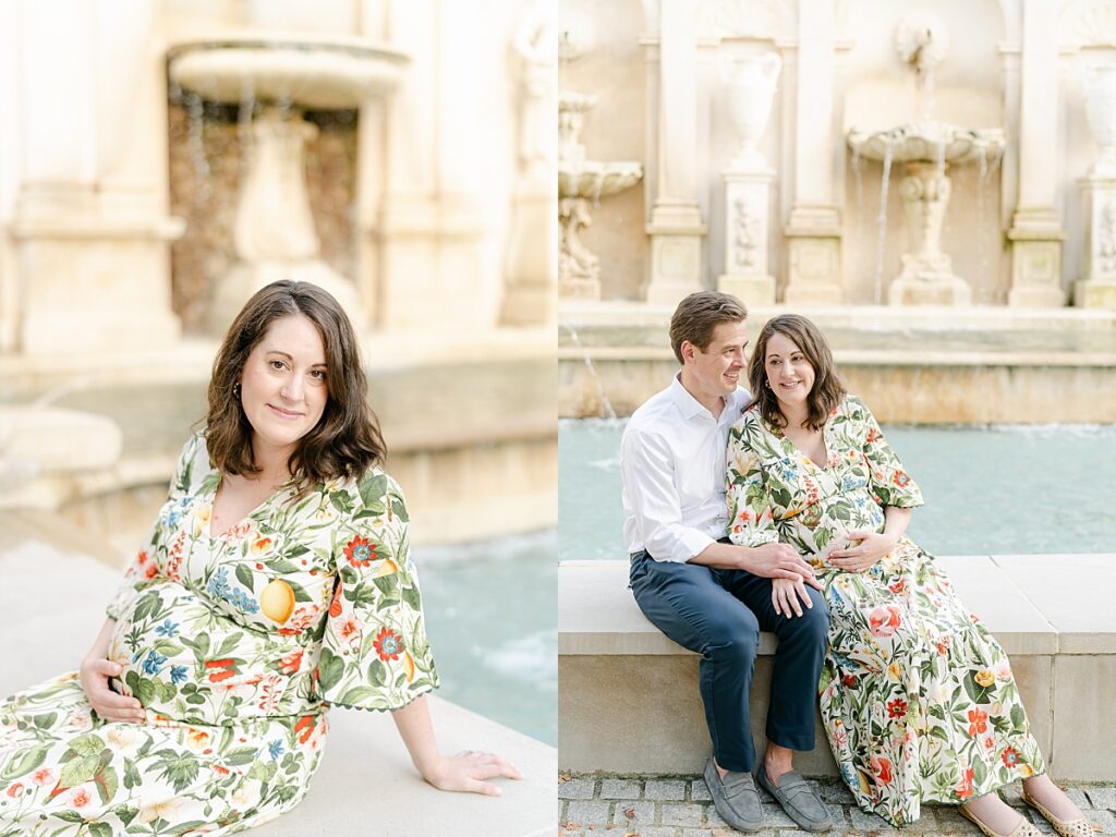 a maternity session for expecting parents sitting on a fountain ledge while holding each other at Longwood Gardens