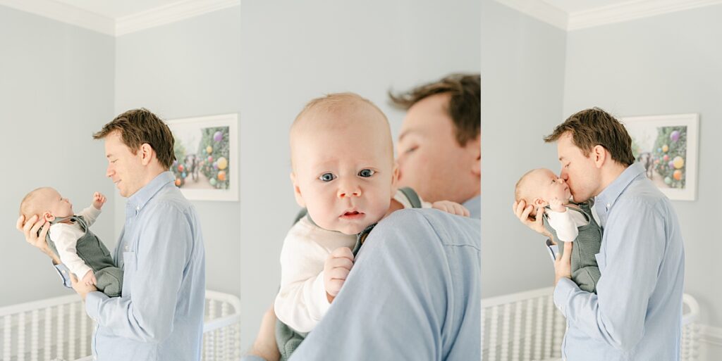 Dad holding baby in bright blue nursery by Philadelphia Baby Photographer, AnneMarie Hamant